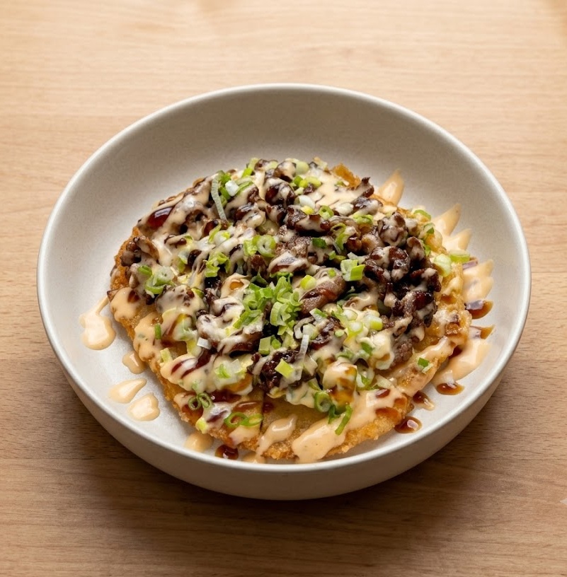 Teriyaki Beef Pizza signature fusion dish at Sushi Kuni Japanese restaurant St. Boniface Winnipeg